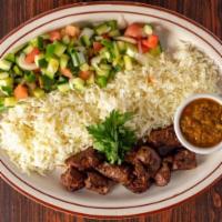BEEF TIKKA KABAB  · Grilled skewered beef tenderloin in fresh Afghan spices and seasoning.