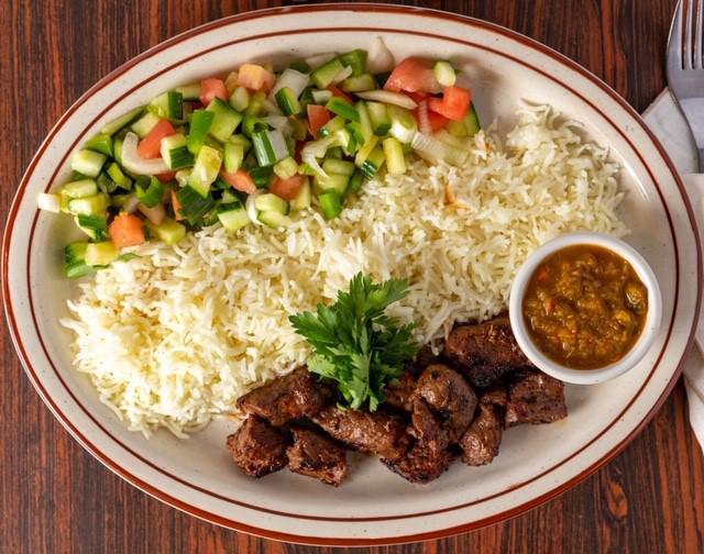 BEEF TIKKA KABAB  · Grilled skewered beef tenderloin in fresh Afghan spices and seasoning.