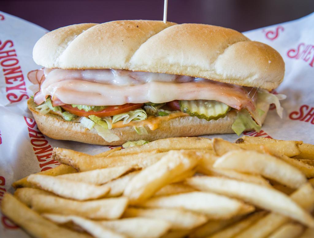 Slim Jim Sandwich · Grilled, smokehouse ham served on a toasted hoagie with melted Swiss cheese, tomatoes, lettuce, pickles and our signature Shoney's sauce. Includes french fries. Shoney's signature item.