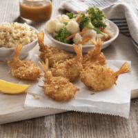 Pile O' Shrimp · A dozen large shrimp, hand-breaded in our homemade bread crumbs and lightly fried. Served wi...