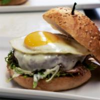 Good Morning Burger · Fried egg, smoked applewood bacon, frisée, Jack cheese, dill dressing, on ACME sesame bun.