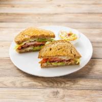 BLT Sandwich · Bacon, lettuce, tomato, avocado, mayo, wheat bread.
