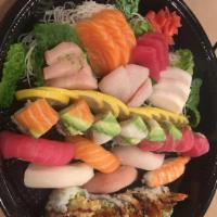 Sushi Boat · 12 pcs sushi, 15pcs sashimi, rainbow roll and shrimp tempura roll. served with 2 miso soup a...
