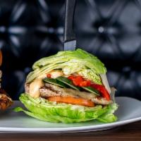 What the Cluck Meal (Limited Time Offer) · Lettuce wrapped keto burger with Grilled Chicken, Swiss Cheese, Cucumber, Roasted Red Pepper...