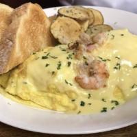 Mariner Omelet · Shrimp, lump crab meat and topped with hollandaise.
