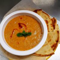 Lentil Soup · Red lentil soup enhanced flavor with carrots, potatoes, mint and spices. Comes with one pita...