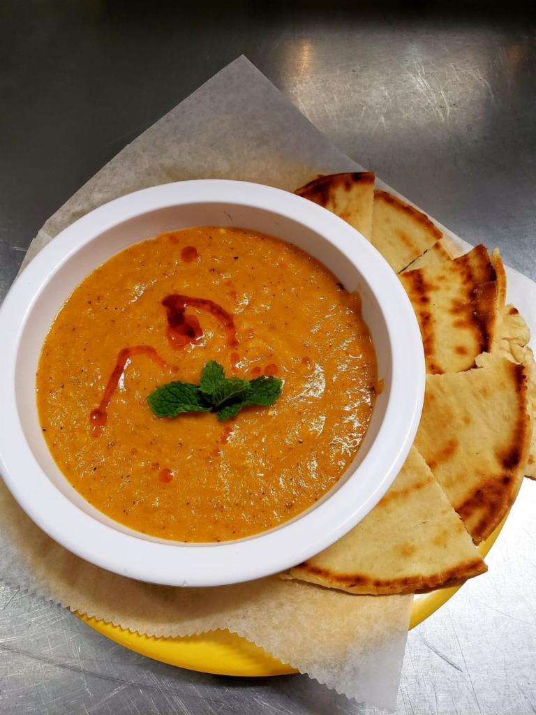 Lentil Soup · Red lentil soup enhanced flavor with carrots, potatoes, mint and spices. Comes with one pita bread