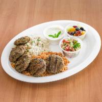 Kofte Kebab · Ground lamb and beef kofte kebab, minced with onions, cumin and parsley, charbroiled. Served...