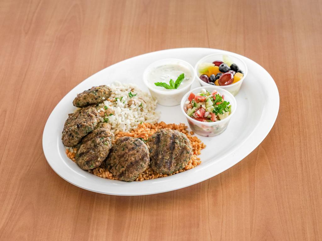 Kofte Kebab · Ground lamb and beef kofte kebab, minced with onions, cumin and parsley, charbroiled. Served with a side of bulgur, pilav, rice, cacik and coban salad.