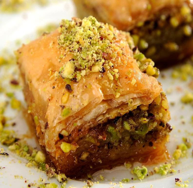 Bakalva · Yes, made form scratch with 50 layers of phyllo dough, filled with 3 layers of walnuts and topped with pistachio. Syrup contains honey. Nut allergy warning - containing nuts Serving of 3 to 4 pieces. Depending on size for cut of the day.