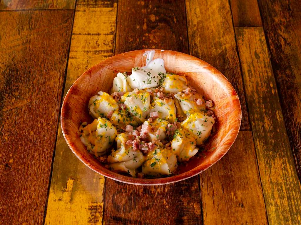 Loaded Dumplings · Dressed with butter, cheese, bacon and ham.
Balanced meal - choose from 7 filling options.
