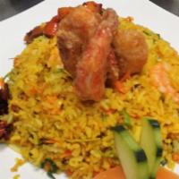 Sri Lankan Fried Rice · Steamed Basmati Rice , pan fried with veggies, eggs & other spices with your choice of prote...