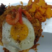 Nasi Gorang · Indonesian style twisted spicy pan fried rice with turkey scrambled egg, sausages, chicken &...