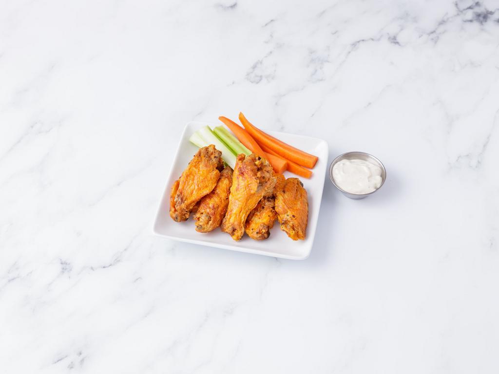 Vesper Wings · Served with your choice of Classic Buffalo sauce or Asian sauce.