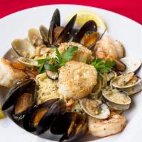 Linguini with Frutti Di Mare · Clams, green lip mussels, scallops, and shrimp.