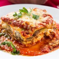 Baked Meat Lasagna · Layered dish with wide flat pasta. Cooked in an oven.