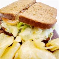 Tuna Melt · Tuna, melted provolone cheese, lettuce, tomato and mayo on choice of bread with the choice o...