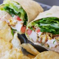 Chicken Ranch Wrap · Grilled chicken breast, bacon, cheddar cheese, lettuce, tomato, and cilantro ranch dressing ...