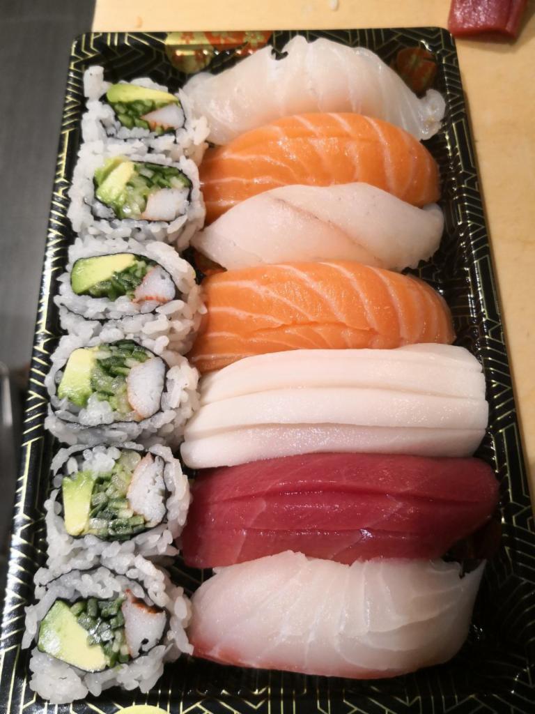 Sushi Regular · Seven pieces of sushi and a California roll. Served with miso soup or salad.