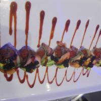 6. Black Dragon Roll · Spicy crunchy tuna inside, topped with eel avocado and black tobiko.