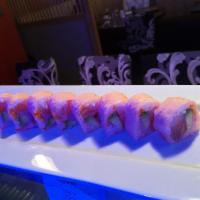 8. Volcano Roll · Spicy crunchy tuna and salmon avocado inside, wrapped soybean peper hot sauce.