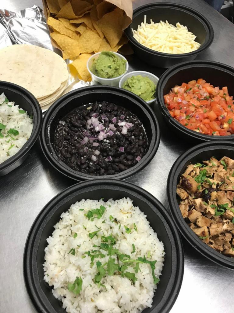 EZ Family Dinner Fiesta / Up to 6 People  · Family Style Meal Pack, Comes with Rice, Beans, 1 Choice of Meat, 1 Choice of Salsa, Cheese, Tortillas, Side of Guacamole, Chips and 1 Order of Churros. Make Tacos or a Plate. 