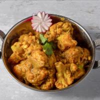 Bhuna Gobi(V) · Cauliflower cooked with onions, ginger and garlic. Vegan.