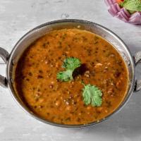 Dal Makhani · A mixture of lentils and kidney-beans cooked with butter and spices.
