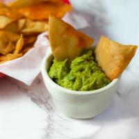 Fresh Guacamole and Chips · A creamy dip made from avocado.