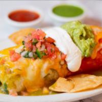 5 de Mayo Burrito · Choice of filling, rice and beans topped with green and red sauce, melted cheese, guacamole,...