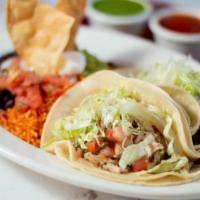 2 Tacos Combo · Soft or crispy. Served with rice, beans, guacamole, pico de gallo and sour cream.