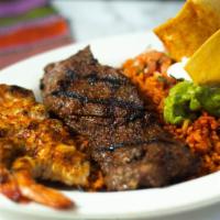 Chelsea Platter · Grilled shrimp and skirt steak. Served with rice, beans, guacamole, pico de gallo and sour c...