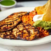 Grilled Chicken Platter · White meat grilled chicken served with rice, beans, guacamole, pico de gallo and sour cream.