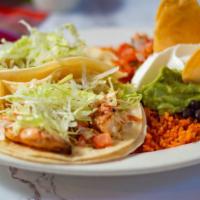 2 Shrimp Tacos Platter · Soft or crispy. Served with rice, beans, guacamole, pico de gallo and sour cream.
