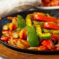 Shrimp Fajita Platter · Sauteed shrimp with bell peppers, onions and mild chef sauce. Served with rice, beans, guaca...