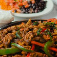 Chicken Fajita Platter · Marinated chicken breast sauteed with bell pepper, onions and mild chef sauce. Served with r...