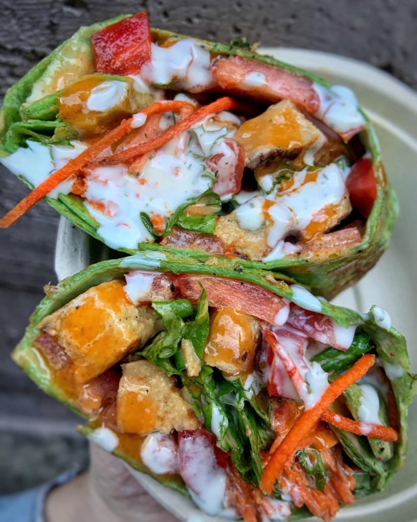 Buffalo Wrap · crispy chik’n. buffalo sauce. ranch. carrots. iceberg. tomatoes. spinach wrap. side chips & salsa. (upgrade to fries, sweet potato fries or soup +2.95)