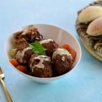 Falafel · Deep fried patties made from highly spiced, ground chickpeas mixed with parsley and onions.