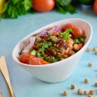 Kidney & Garbanzo Bean Salad · Red kidney and garbanzo beans mixed with lemon juice, olive oil, cilantro, red onions, and r...