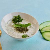 Tzatziki Dip · A cool and creamy Greek cucumber dill yogurt dip flavored with garlic. Served with fresh Pit...