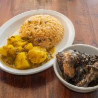 Jamaican Jerk Chicken Plate · Marinated chicken baked in spicy jerk. Served with rice and choice of vegetable.