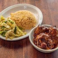 Stewed Oxtail Plate · Tenderized and slow cooked to perfection in a tomato based sauce.  Served with rice and choi...