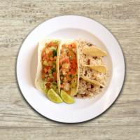 Cabo Fish Tacos · 2 flour tortillas stuffed with blackened seasonal fish, pineapple salsa, cabbage, topped wit...