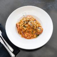 Linguine ai Gamberi · House-made, sun-dried tomato linguine tossed with basil and gulf shrimp in a creamy vodka sa...