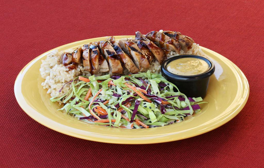 Teriyaki Chicken Yumm! Bento · Organic Brown Rice or Thai Jasmine Rice served with our creamy ginger Asian Cole Slaw and a side of Yumm! Sauce.