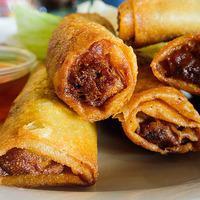 Nem · Ground beef, chicken, shrimp and vegetables fried into an egg roll.