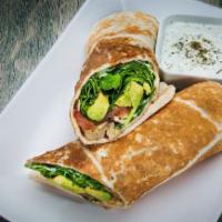 Veggie Delight Sandwich · Fresh avocados, provolone cheese, mushrooms, tomatoes, spinach and mayo, wrapped in fresh pi...