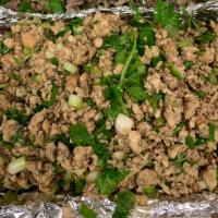 Larb Chicken Salad (Thai Lettuce Wraps) · Minced chicken mixed with lime, toasted rice, green onion, cilantro and chili served with le...