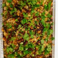 Nam Sausage Rice Salad · Deep fried rice balls mixed with nam sausage, lime, green onion, cilantro topped with peanut...
