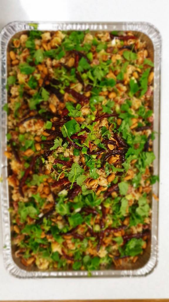 Nam Sausage Rice Salad · Deep fried rice balls mixed with nam sausage, lime, green onion, cilantro topped with peanut and roasted chili served with lettuce. 